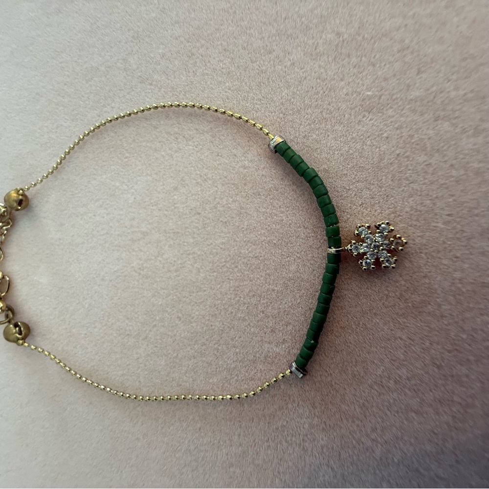 Elegant 24K Gold Plated Bracelet with Jade green accents and Snowflake Charm